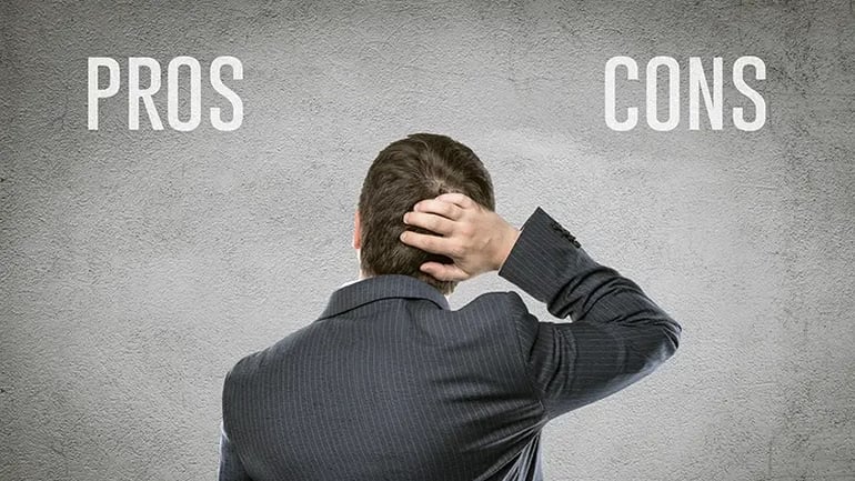 A PERSON THINKING ABOUT THE PROS AND CONS OF LIVING IN STATES WITHOUT INCOME TAX.
