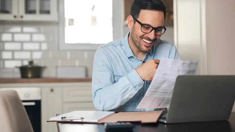 A PERSON REVIEWING THEIR TAXES IN AN INCOME TAX FREE STATE.