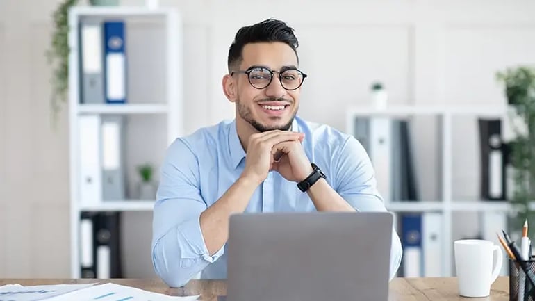 A YOUNG ACCOUNTANT READY TO KICK OFF THE TAX FILING SEASON.