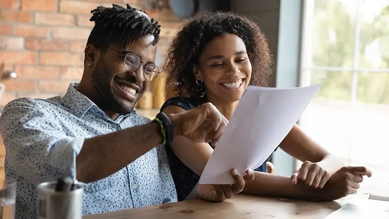 A COUPLE DISCUSSING THEIR TAX CREDITS.