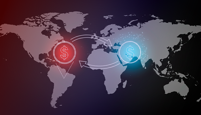Imagem do mapa-múndi com uma ilustração de dinheiro sendo transferida de um país para outro
