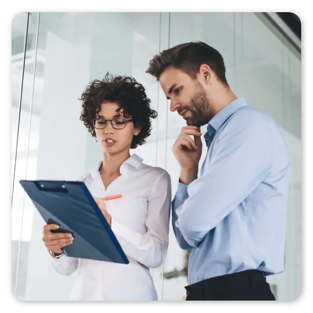 Two workers seeing reports