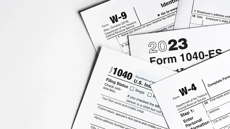 A PHOTO OF TAX FORMS.